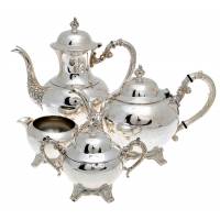 Чайно-кофейный набор из 4 предметов: чайник, сахарница, молочник, кофейник.  Металл, глубокое серебрение. Oneida, США, 1940-е гг.