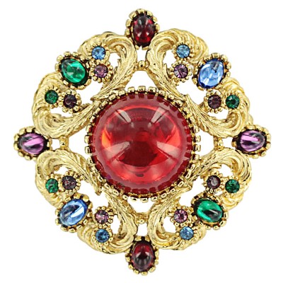 Брошь "Рубиновый свет" от Sphinx, кристаллы огранки "кабошон", разноцветные стразы, бижутерный сплав "старое золото". Великобритания, 1990-е годы Брошь "Рубиновый свет" от Sphinx, кристаллы огранки "кабошон", разноцветные стразы, бижутерный сплав "старое золото". Великобритания, 1990-е годы