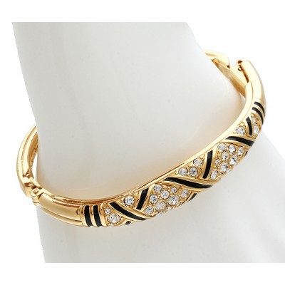 Браслет "Санта-Лючия" от Swarovski. Кристаллы Сваровски, черная эмаль, бижутерный сплав золотого тона. США, 2000-е гг. Браслет "Санта-Лючия" от Swarovski. Кристаллы Сваровски, черная эмаль, бижутерный сплав золотого тона. США, 2000-е гг.