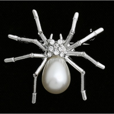 Брошь "Паук с жемчужиной". Прозрачные стразы, искусственная жемчужина, бижутерный сплав серебряного тона. Гонконг, 2005 Брошь "Паук с жемчужиной". Прозрачные стразы, искусственная жемчужина, бижутерный сплав серебряного тона. Гонконг, 2005