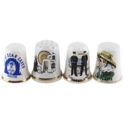 Комплект коллекционных наперстков, 4 шт. Фарфор, Великобритания, вторая половина 20 века Комплект коллекционных наперстков, 4 шт. Фарфор, Великобритания, вторая половина 20 века