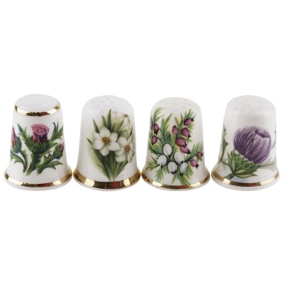 Комплект коллекционных наперстков "Цветы", 4 шт. Фарфор, Великобритания, вторая половина 20 века Комплект коллекционных наперстков "Цветы", 4 шт. Фарфор, Великобритания, вторая половина 20 века