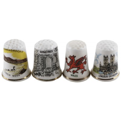 Комплект коллекционных наперстков "Микс", 4 шт. Фарфор, Великобритания, вторая половина 20 века Комплект коллекционных наперстков "Микс", 4 шт. Фарфор, Великобритания, вторая половина 20 века